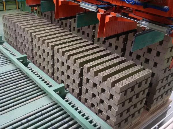 Setting kiln cars.